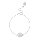 Silver friendship bracelet with delicate coin depicting goddess Lakshmi on white background by Loft & Daughter