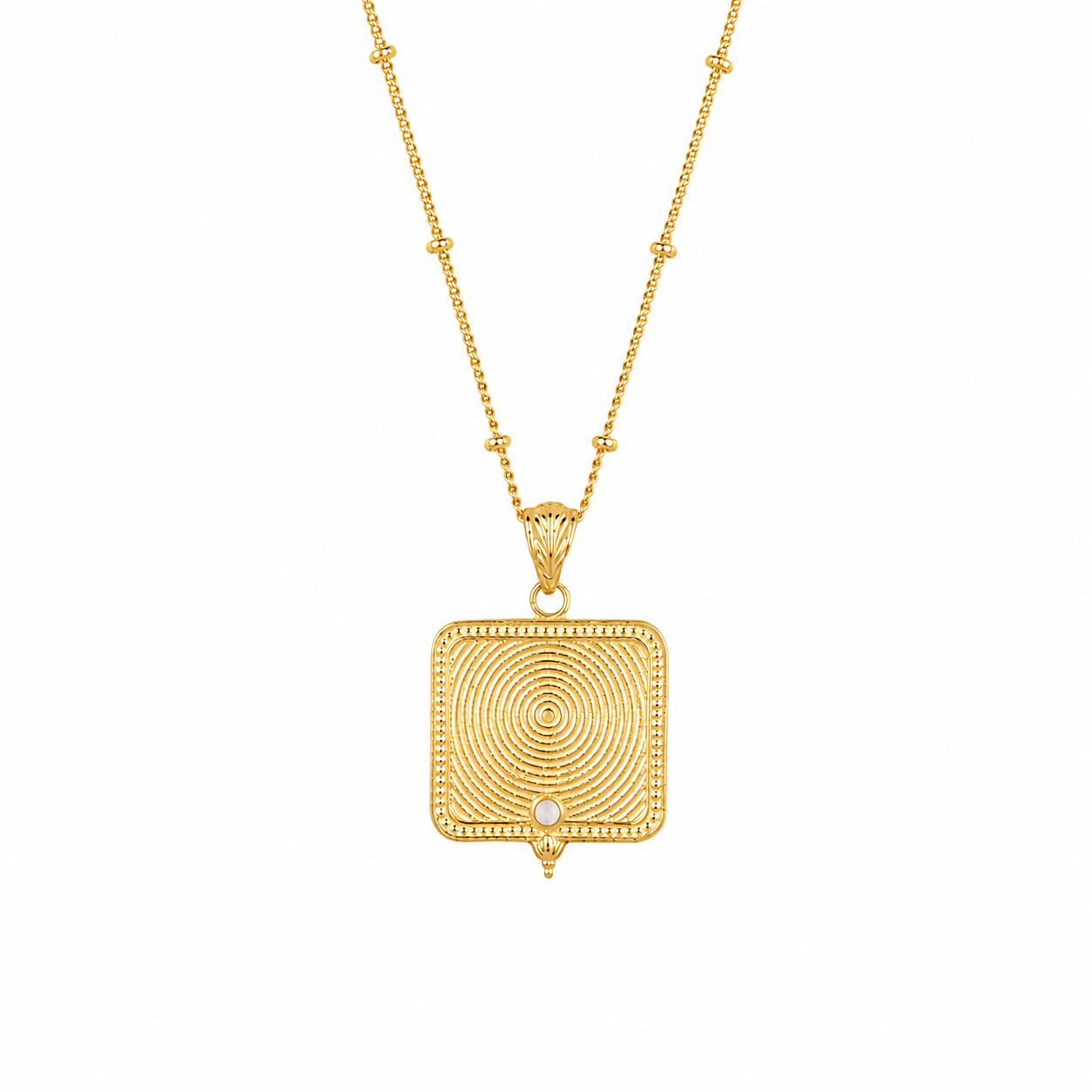 Reverse of gold vermeil Saraswati pendant showing spiral engraving and pearl detail
