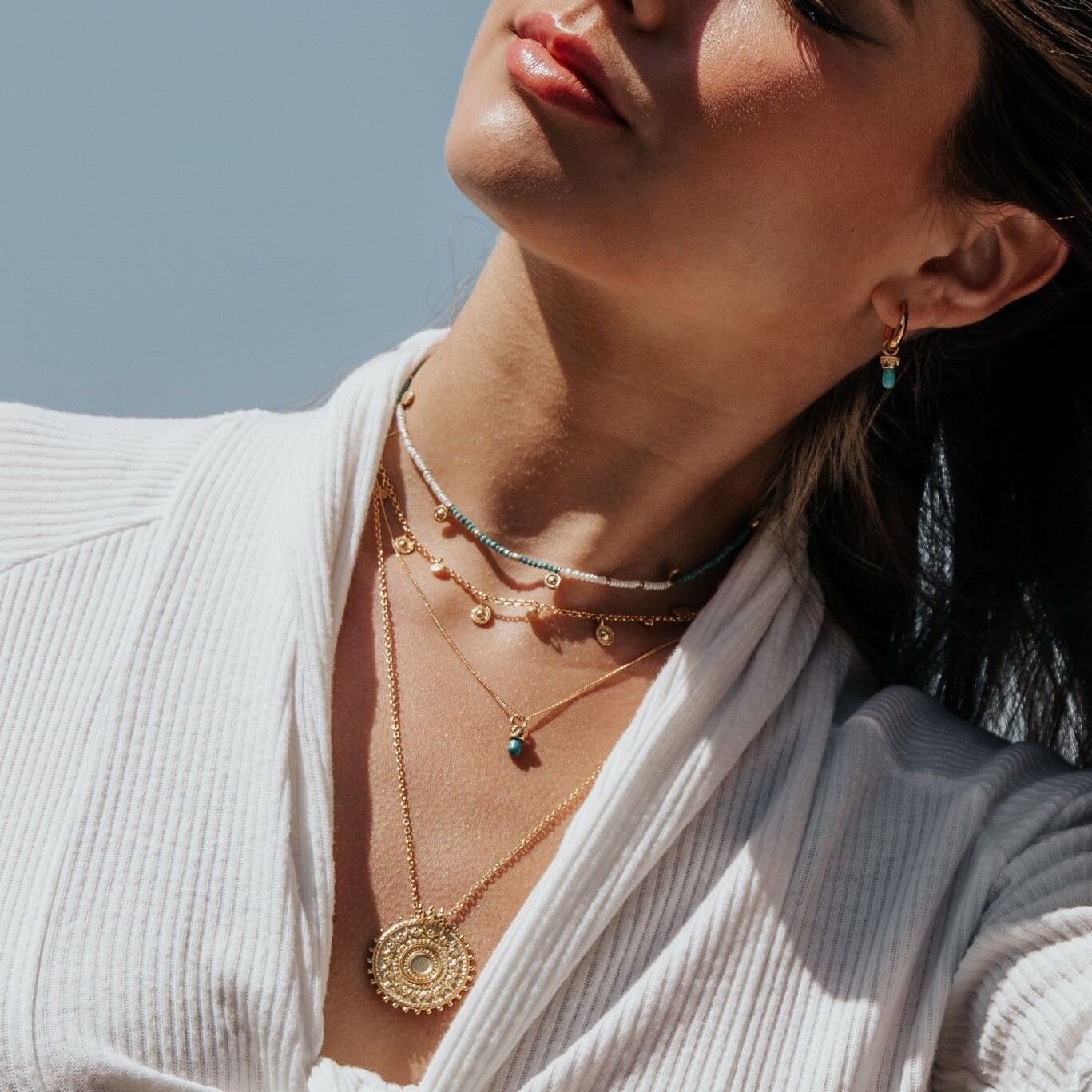 Model wearing boho summer necklace stack by Loft and Daughter