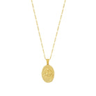 A gold vermeil pendant necklace featuring an engraved depiction of the Hindu goddess Durga on a chain.