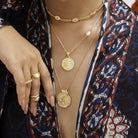 Boho layering necklaces by Loft & Daughter featuring gold vermeil Ganesh charm and Athena pendant