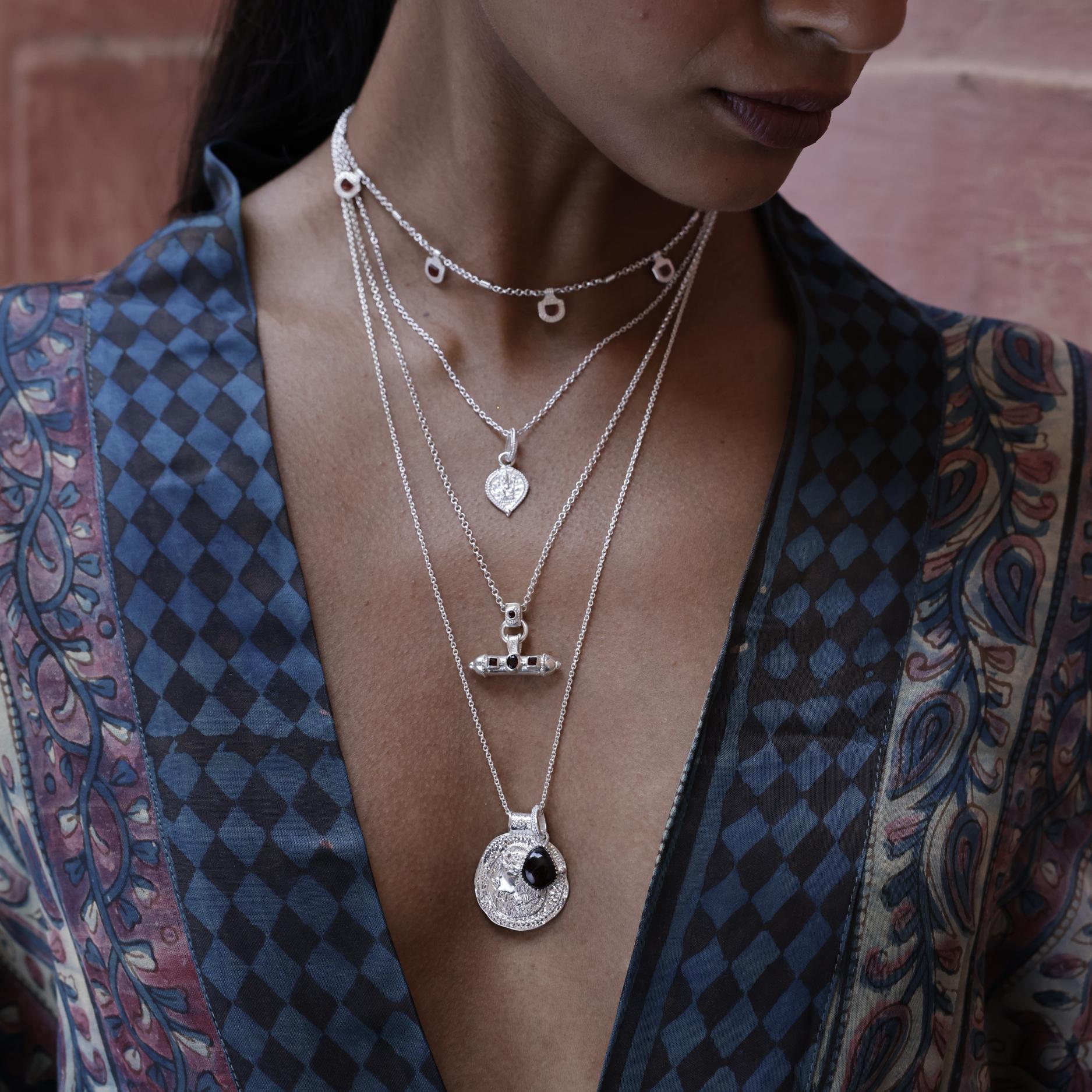 Bohemian Loft & Daughter silver layering necklaces worn by model with patterned kimono