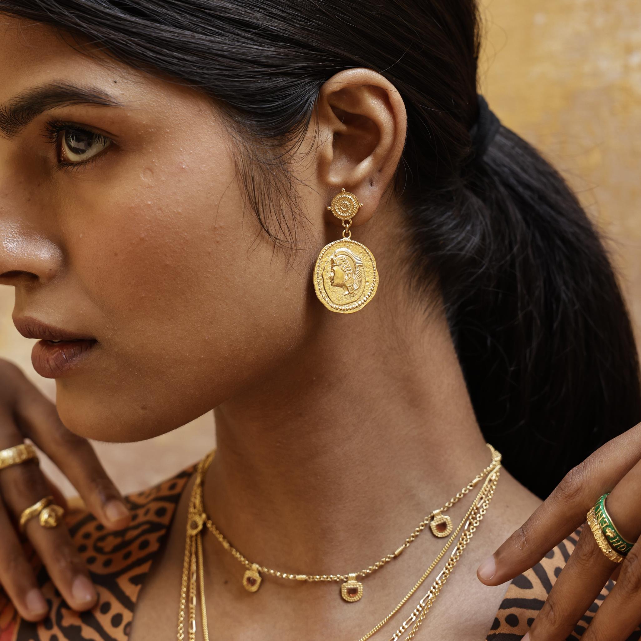Model wearing You Got This Athena large coin earrings, inspired by the warrior goddess