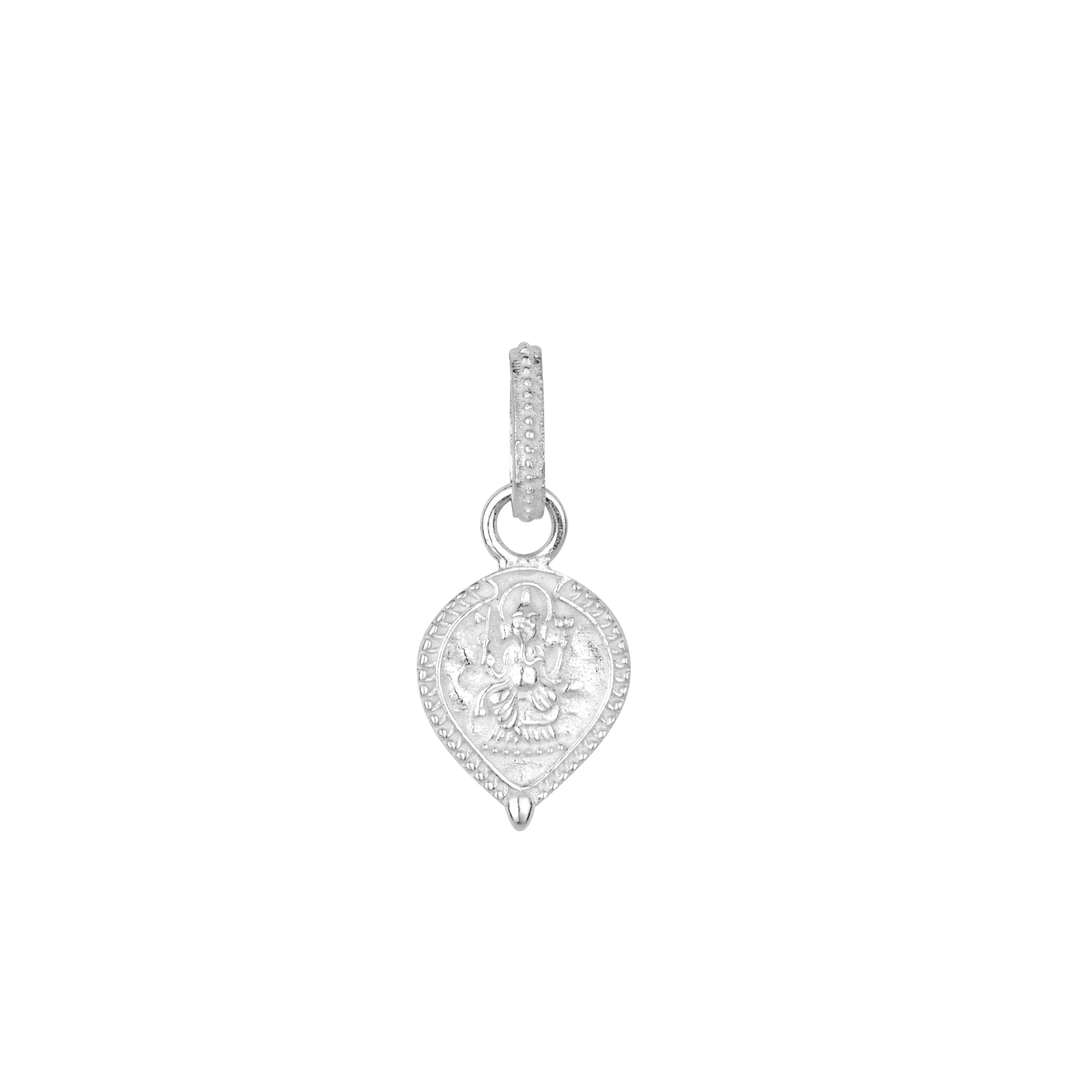 Silver charm with intricate Ganesh design on a white background by Loft & Daughter