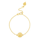 Delicate gold bracelet with round Lakshmi coin by Loft & Daughter on white background