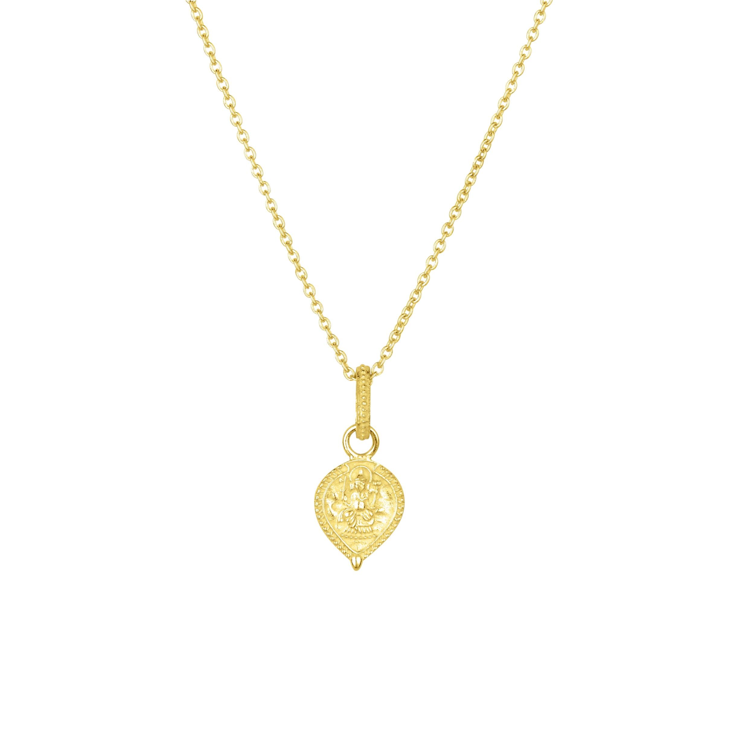 Close-up of Baby Ganesha pendant in gold vermeil, featuring intricate detailing of Lord Ganesha on white background

