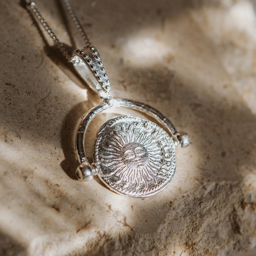 Silver Spinner Pendant with Sun Face