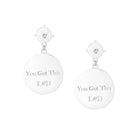 Silver earrings with 'You Got This L&D' text on a white background
