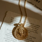 Long gold vermeil Athena pendant symbolising wisdom, courage, and protection