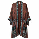 One-of-a-kind midi kimono in rust tribal print silk with teal and cream border, by Loft & Daughter