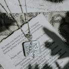 Silver Saraswati pendant necklace on a Loft & Daughter jewellery card